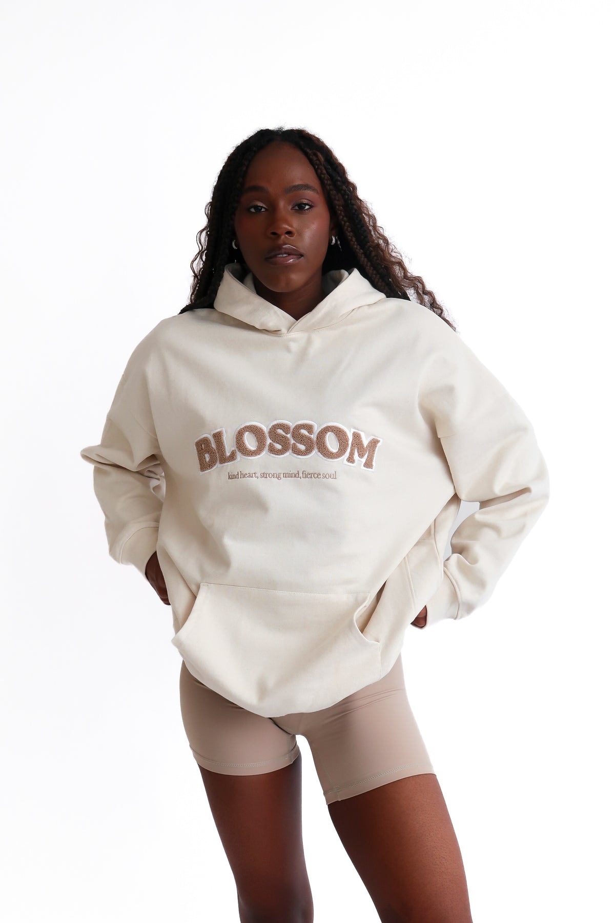 jade hoodie in sand by Blossom with slogan kind heart strong mind fierce soul. recycled materials.
