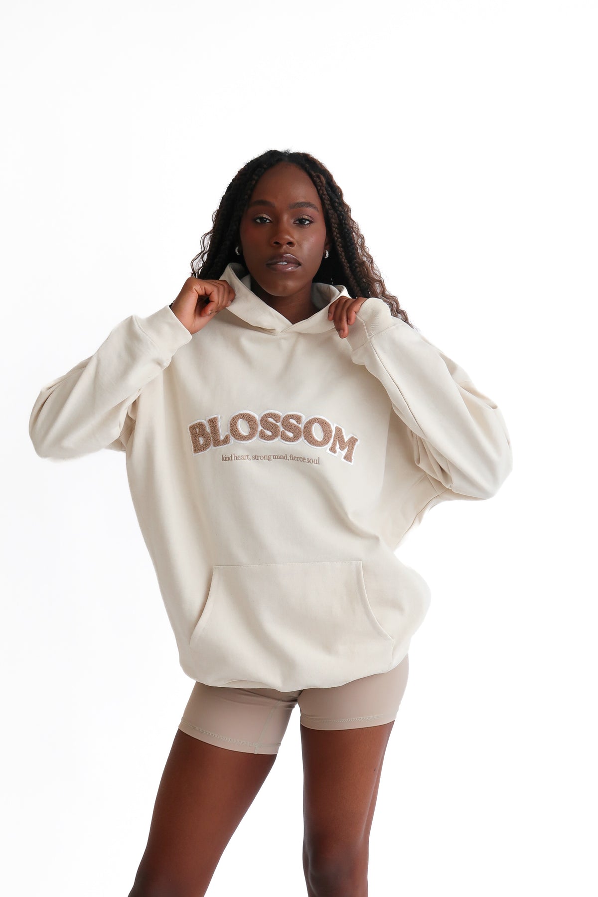 100% recycled materials used. Cream blossom hoodie.