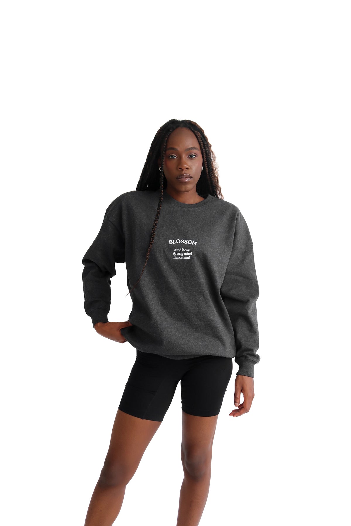 Erin sweatshirt in the colour Shadow worn by model standing up.